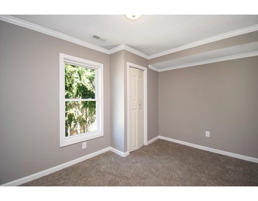 41 Florida Street Springfield, MA 01109 - Photo 16 of 23 an empty room with windows