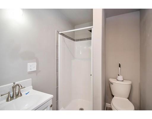 41 Florida Street Springfield, MA 01109 - Photo 8 of 23 a bathroom with a sink and mirror