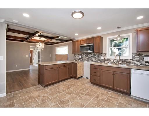 41 Florida Street Springfield, MA 01109 - Photo 9 of 23 a kitchen with a sink appliances cabinets and furniture