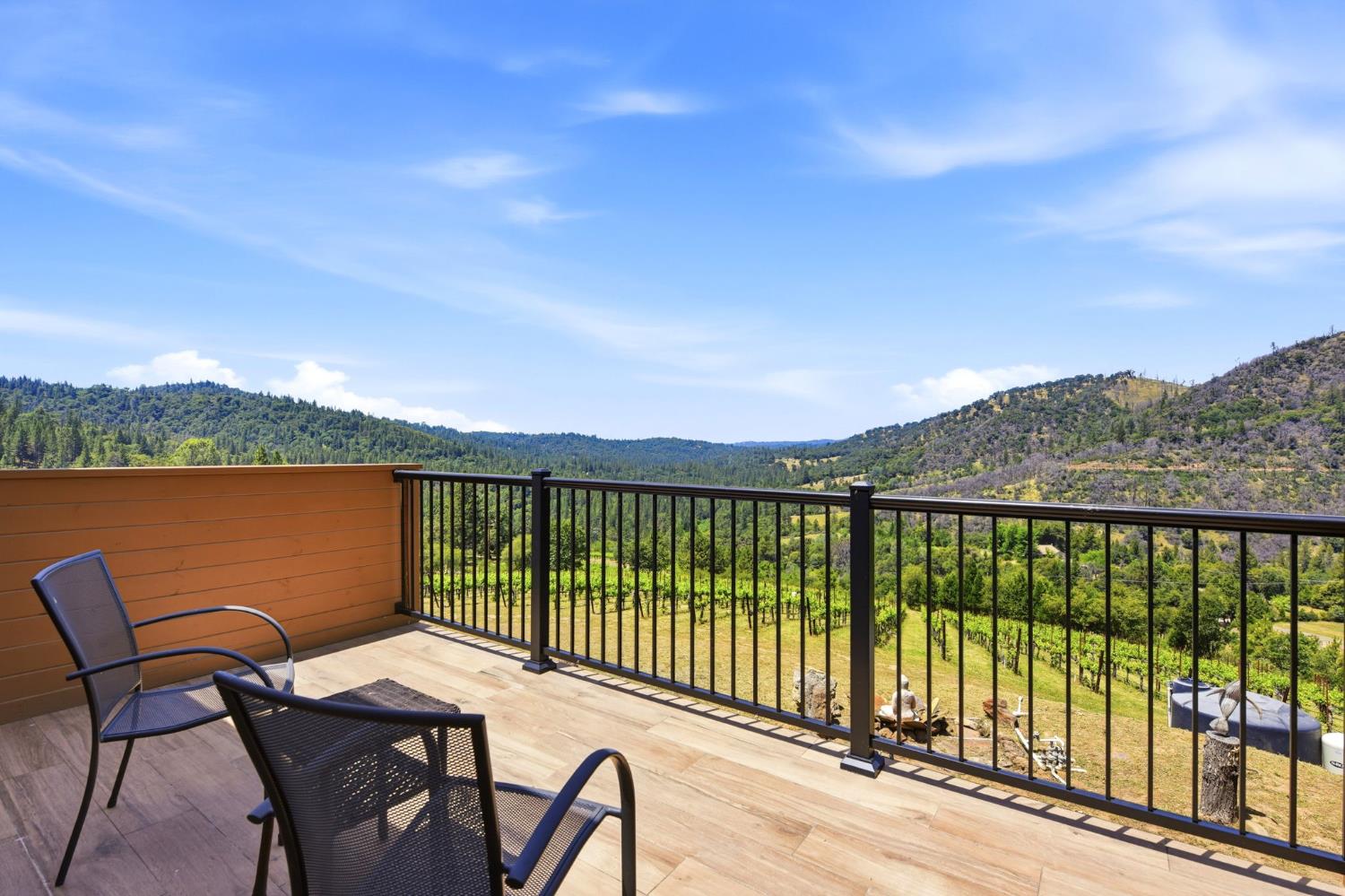 7201 Happy Valley Road Somerset, CA 95684 - Photo 33 of 75 What a great place to hang out on this rooftop deck overlooking the vineyard and the entire Happy Valley. This is a west facing location, so the sunsets are amazing.