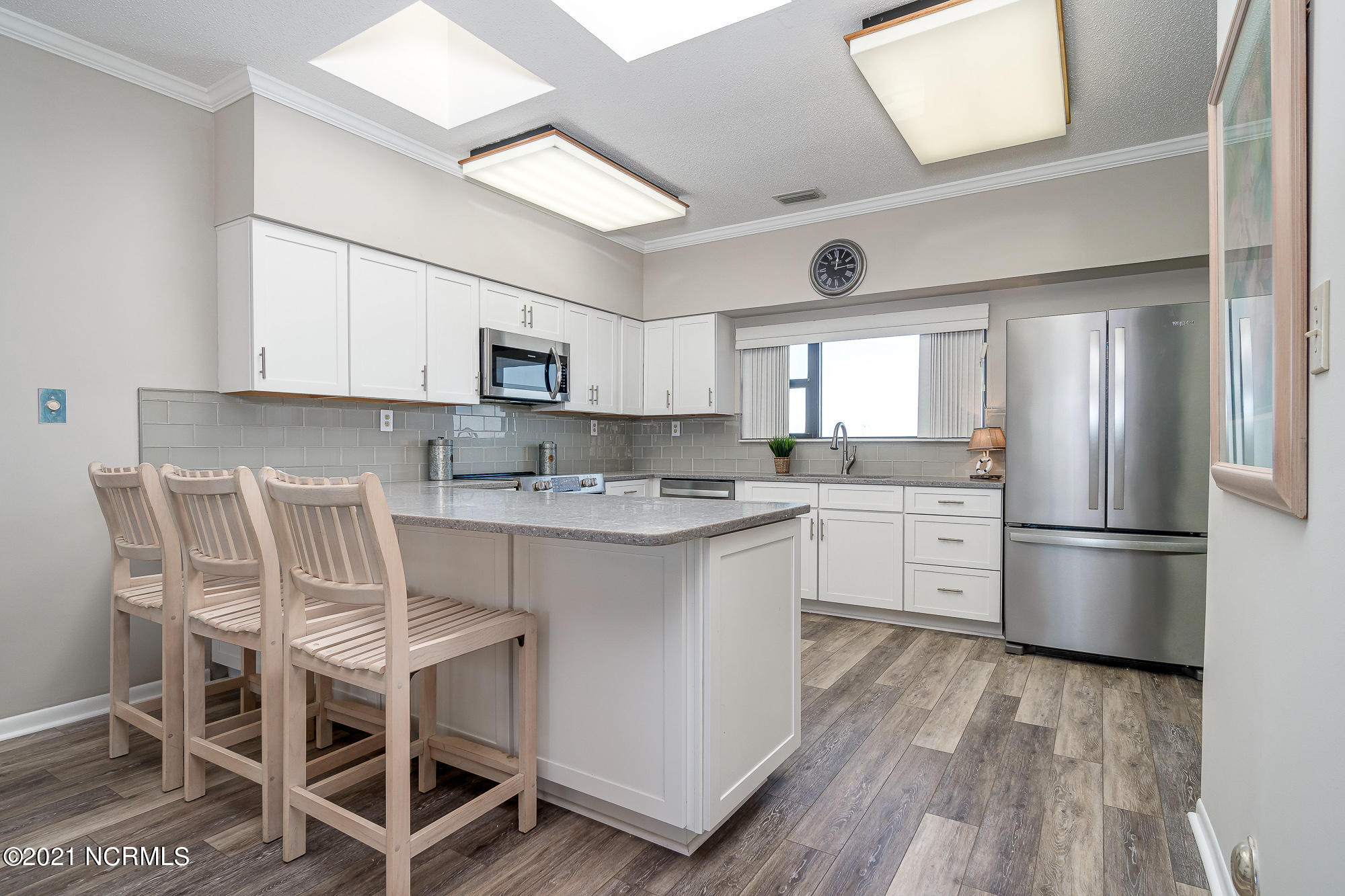 1505 Salter Path Road, Unit 605 Indian Beach, NC 28512 - Photo 17 of 65 Updated kitchen w/ peninsula seating