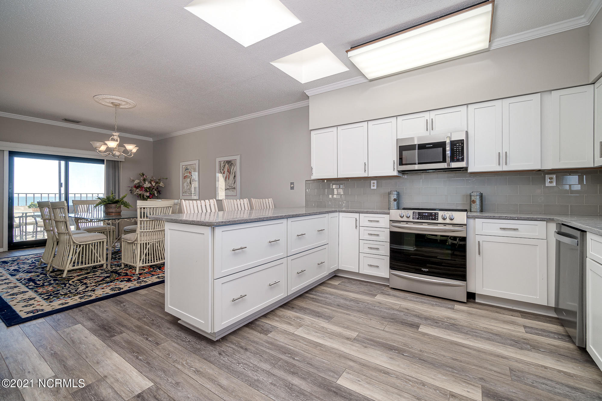 1505 Salter Path Road, Unit 605 Indian Beach, NC 28512 - Photo 19 of 65 Updated kitchen w/ peninsula seating
