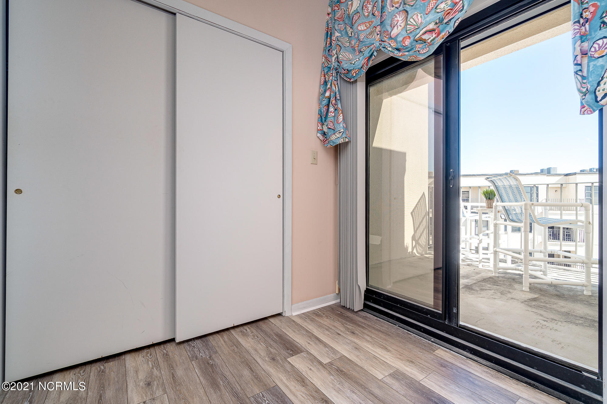 1505 Salter Path Road, Unit 605 Indian Beach, NC 28512 - Photo 29 of 65 Master BR suite w/ balcony access