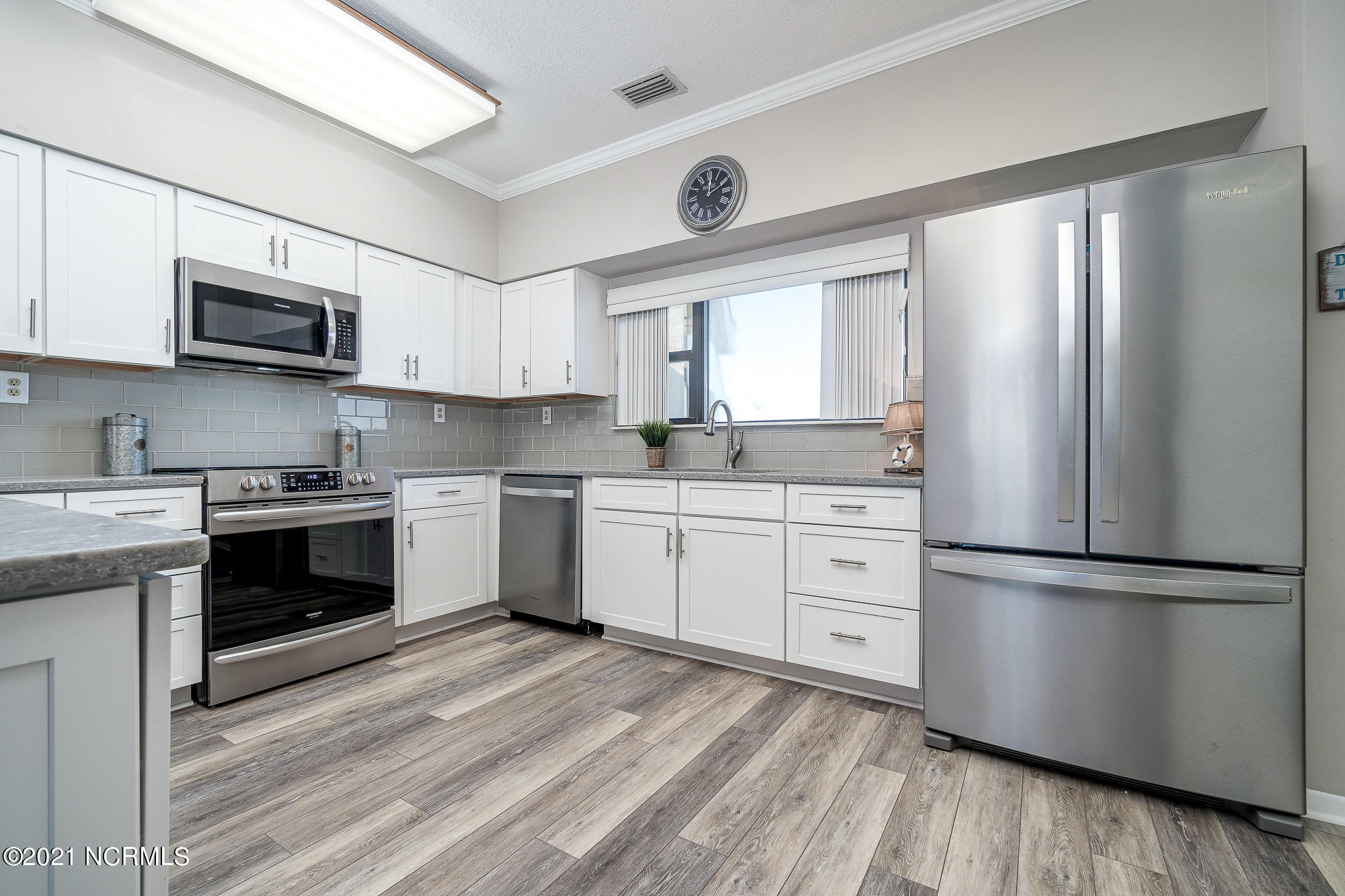 1505 Salter Path Road, Unit 605 Indian Beach, NC 28512 - Photo 4 of 65 Updated kitchen w/ peninsula seating