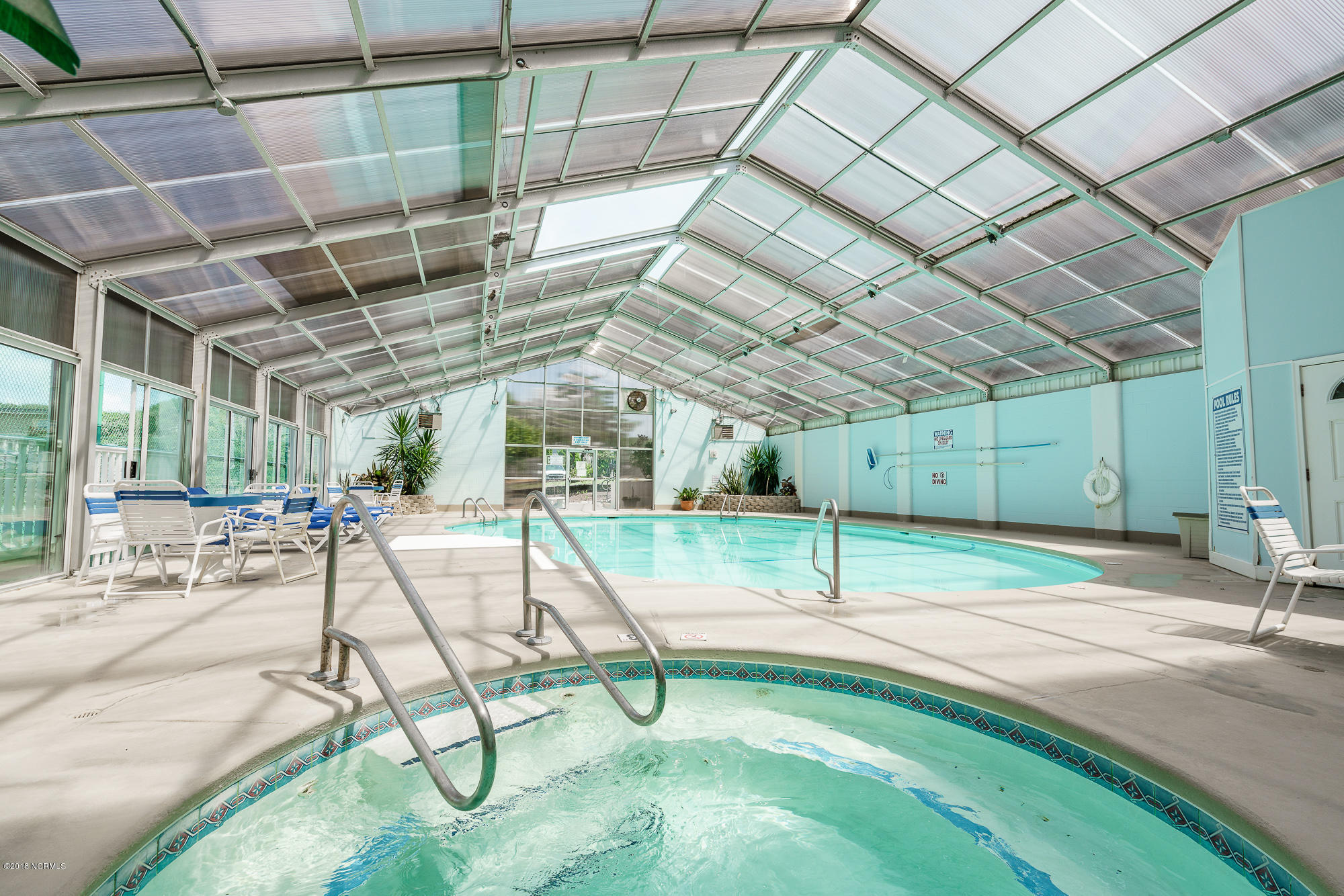1505 Salter Path Road, Unit 605 Indian Beach, NC 28512 - Photo 58 of 65 Hot Tub Overlooking Indoor Pool
