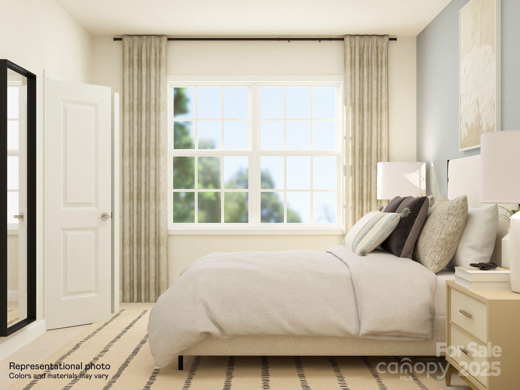 4122 Camden Gln Road Lancaster, SC 29720 - Photo 14 of 26 a bedroom with a bed and a window