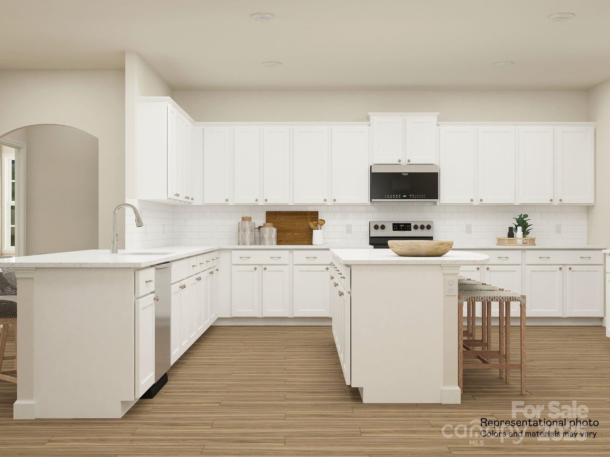 4122 Camden Gln Road Lancaster, SC 29720 - Photo 10 of 26 a kitchen with cabinets stainless steel appliances and a counter space