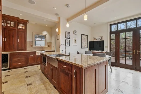 a bathroom with a sink a vanity and a mirror