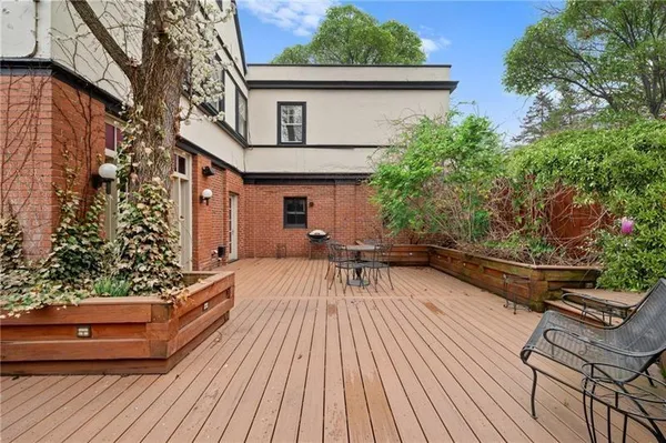 a view of roof deck with patio