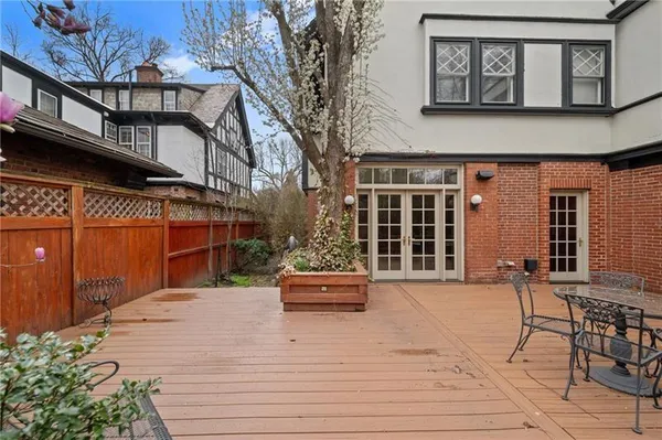 a front view of a building with seating space