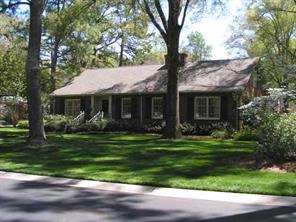 1529 Andover Road Charlotte, NC 28211 - Photo 1 of 8 a front view of a house with a garden
