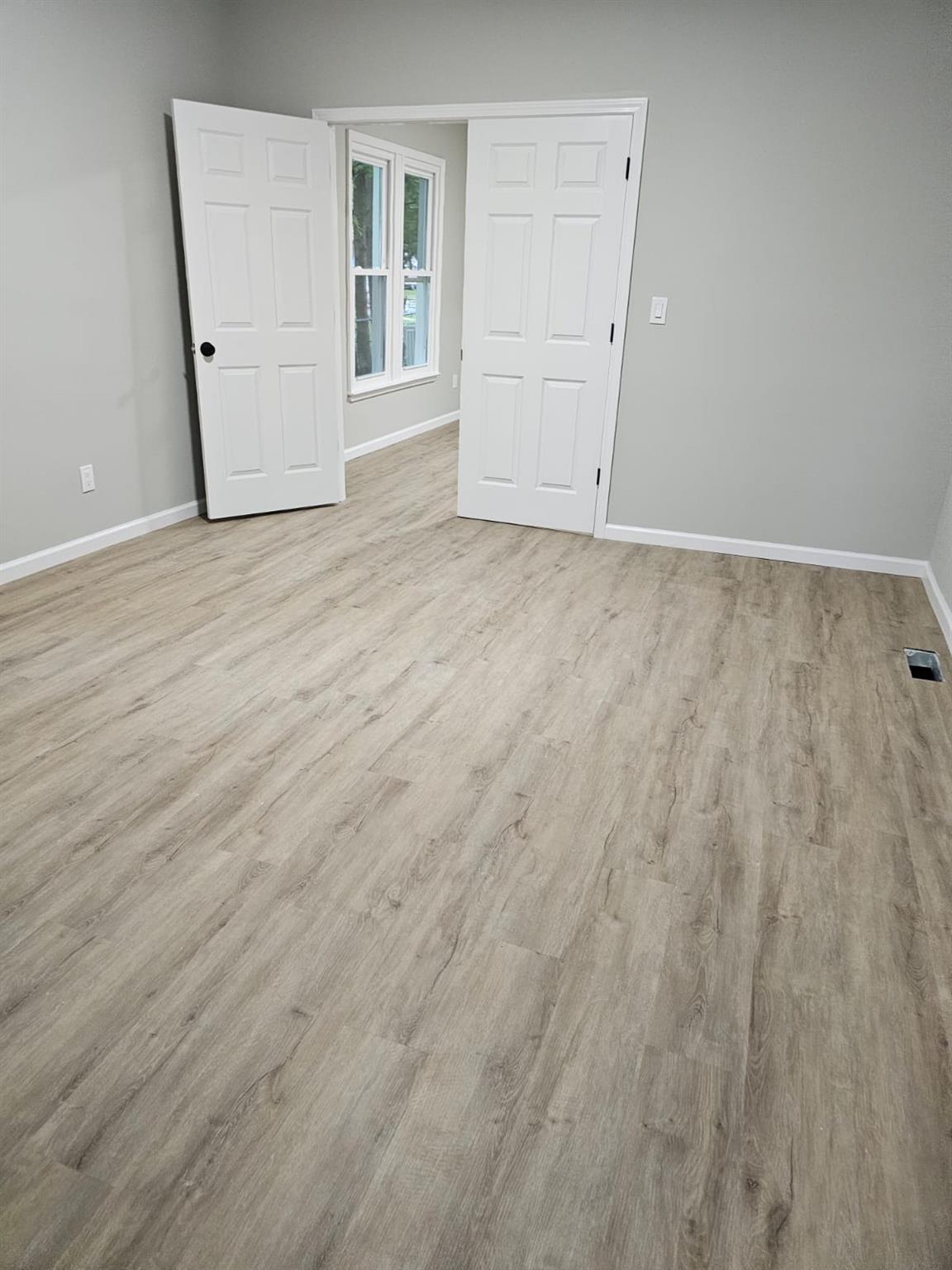 108 Pine Street, Unit #1 Wurtsboro, NY 12790 - Photo 16 of 18 wooden floor in an empty room