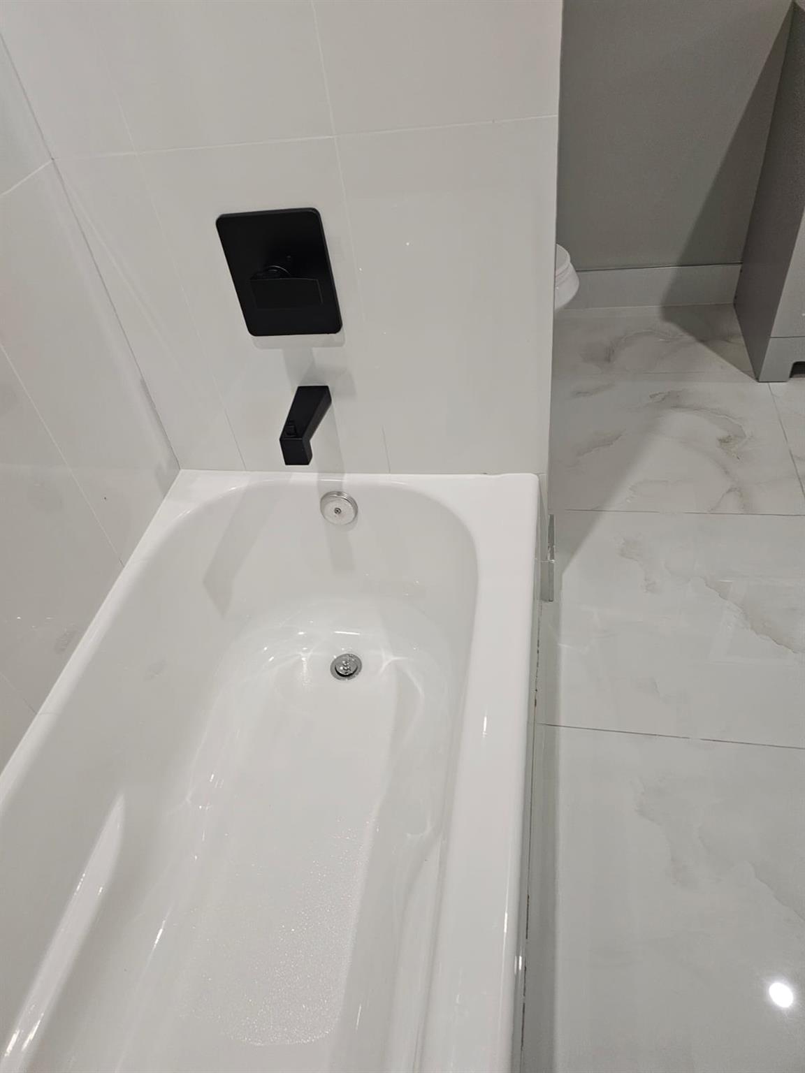 108 Pine Street, Unit #1 Wurtsboro, NY 12790 - Photo 9 of 18 a bathroom with a toilet