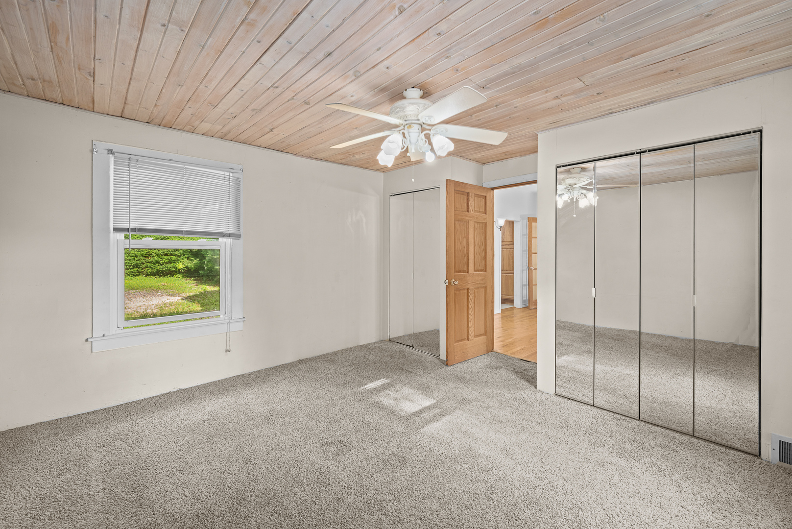 802 North High Street Port Byron, IL 61275 - Photo 29 of 43 an empty room with a ceiling fan and window