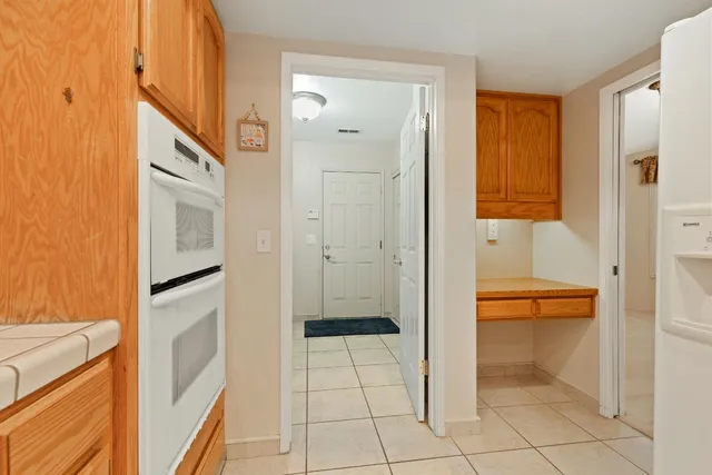 a bathroom with a shower and a mirror