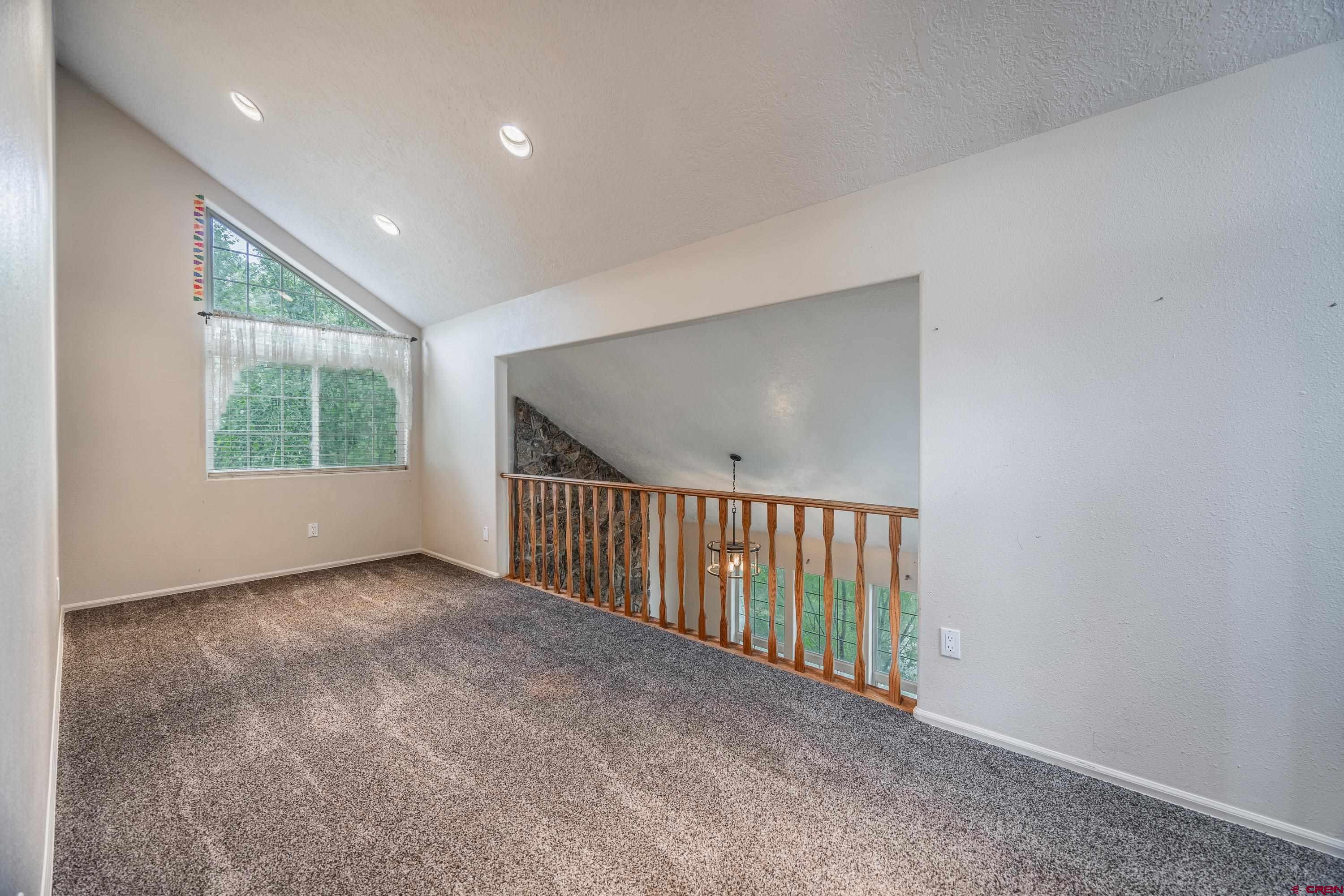 17377 Breeze Road Delta, CO 81416 - Photo 4 of 45 a view of a hallway with windows
