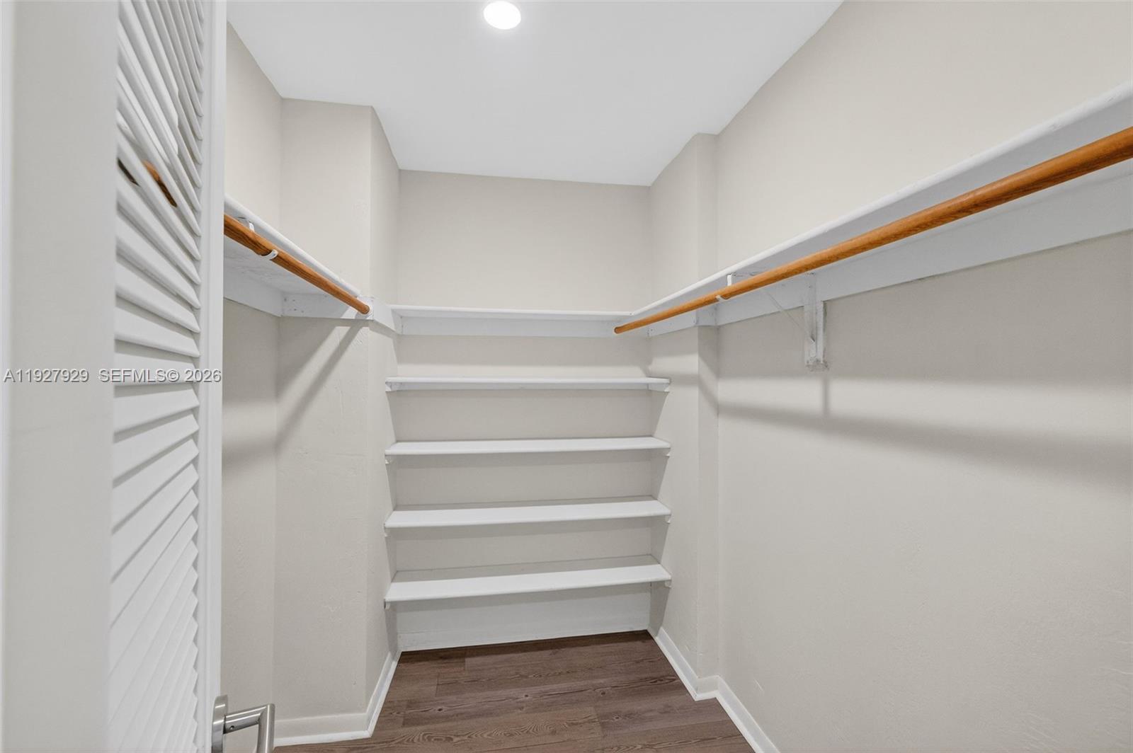 600 Grapetree Drive, Unit 8FS Key Biscayne, FL 33149 - Photo 22 of 54 a view of walk in closet