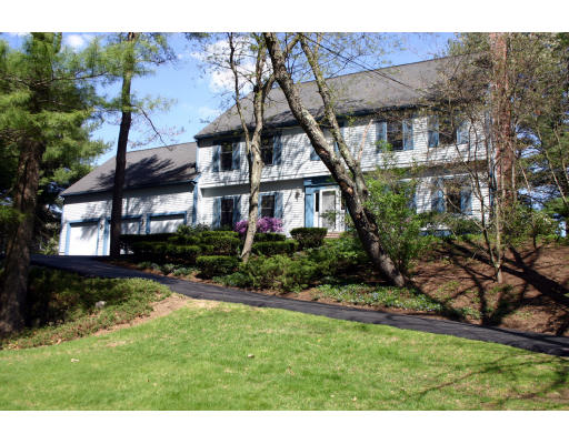 576 Dutton Road Sudbury, MA 01776 - Photo 1 of 22 a house view with a garden space
