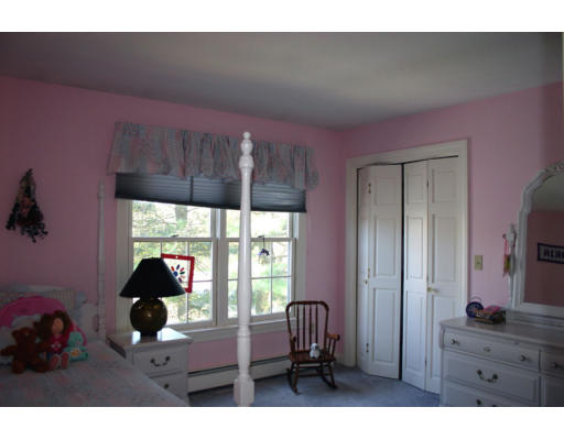 576 Dutton Road Sudbury, MA 01776 - Photo 17 of 22 a living room with furniture and a window