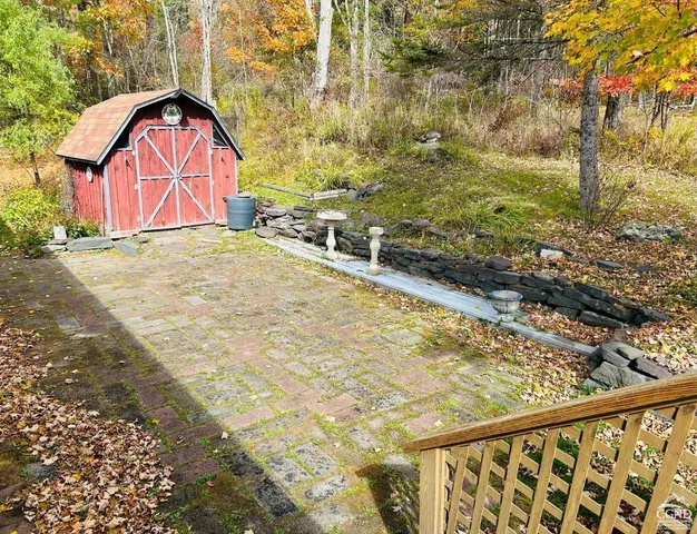 a view of a backyard of a house
