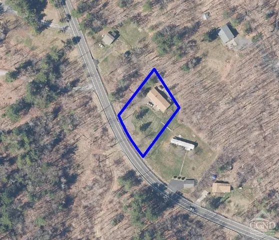 a view of a backyard of a house