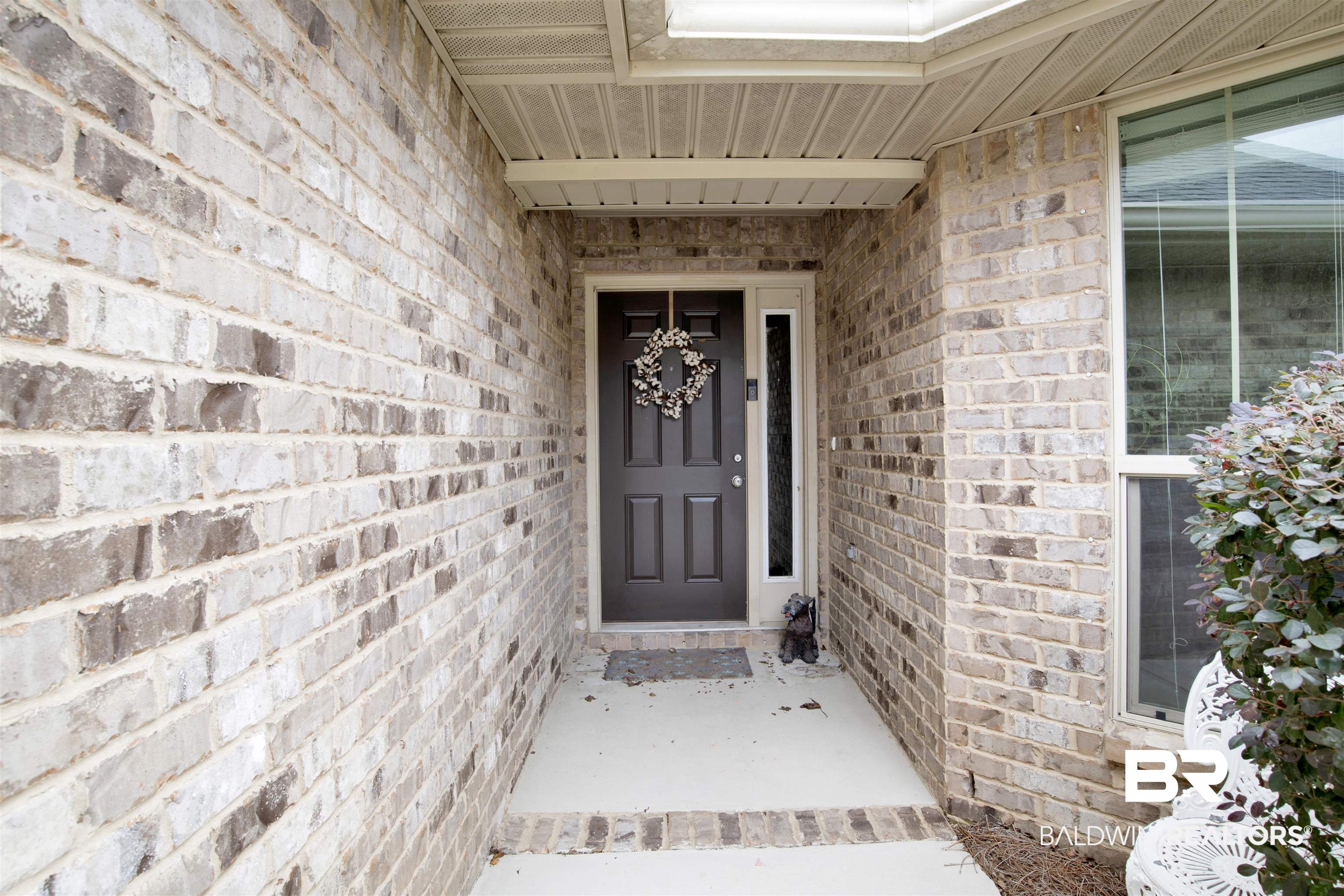 22056 Garland Loop Silverhill, AL 36576 - Photo 24 of 28 Entrance to property featuring brick siding