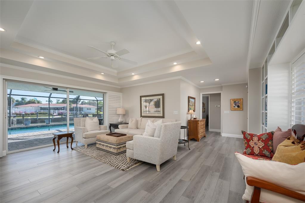 548 Gunwale Lane Longboat Key, FL 34228 - Photo 17 of 62 a living room with furniture and a large window