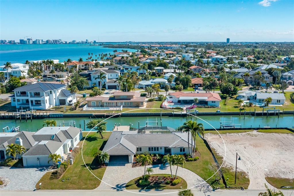 548 Gunwale Lane Longboat Key, FL 34228 - Photo 2 of 62 an aerial view of a house with a lake view