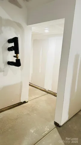 a bathroom with a glass door