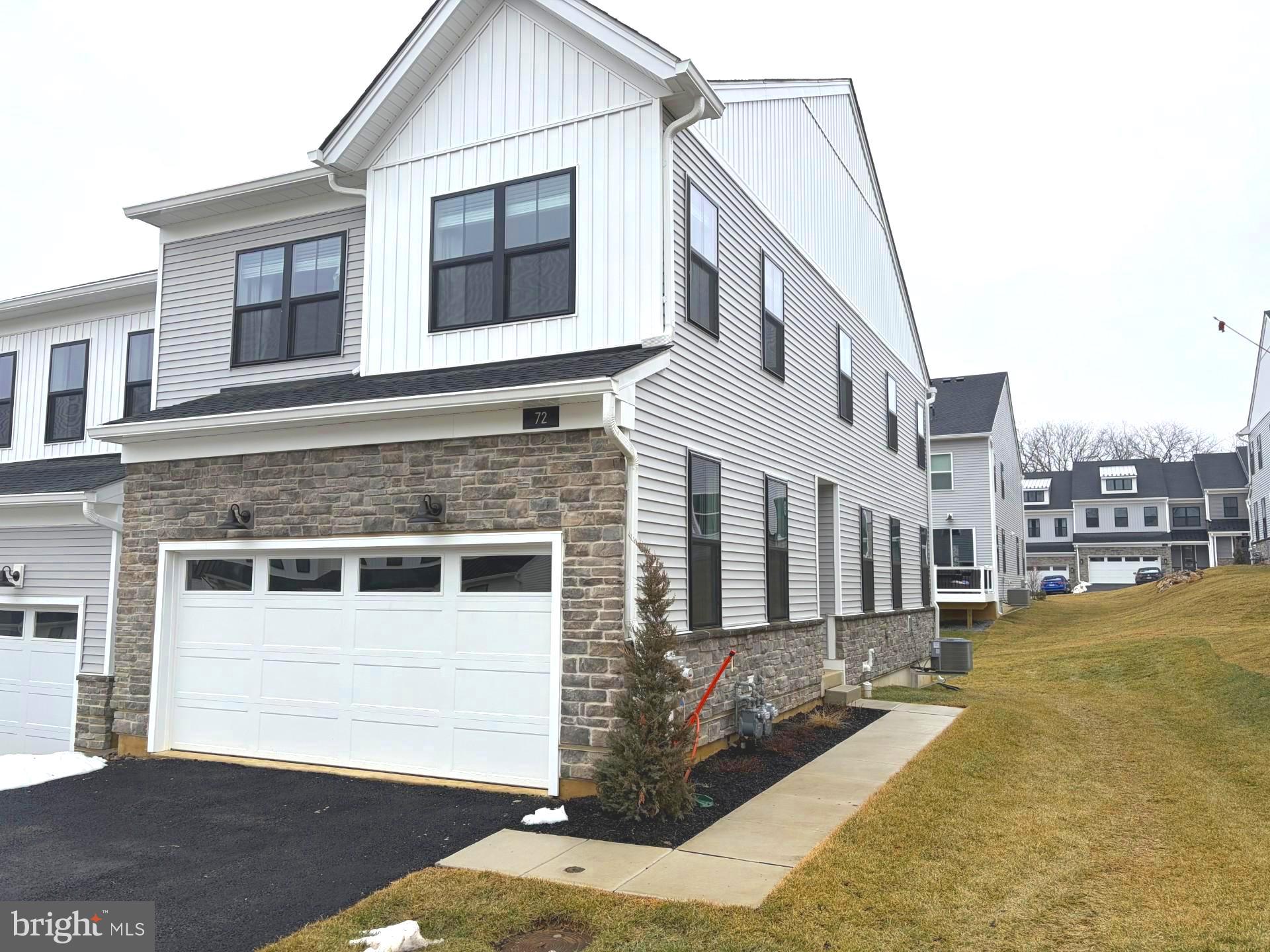 Modern townhome with charming curb appeal.