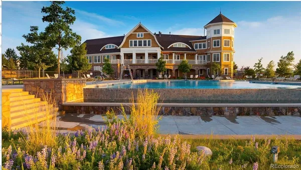 a front view of a house with swimming pool