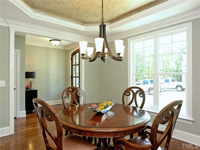 2321 Finley Ridge Lane Raleigh, NC 27615 - Photo 11 of 25 This Dining Room Is Ready To Entertain Your Family And Friends This Holiday Season. Wide And Welcoming Doorways, Detailed Custom Ceilings and Designer Colors HIghlight This Beautiful Room. Dining Room