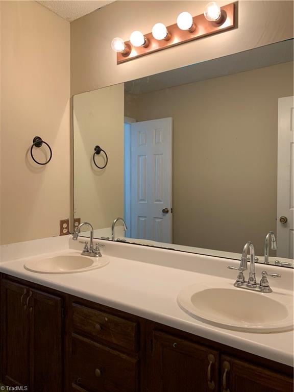 4402 Garden Club Street High Point, NC 27265 - Photo 14 of 23 2nd Bath Vanity with Updated Faucets