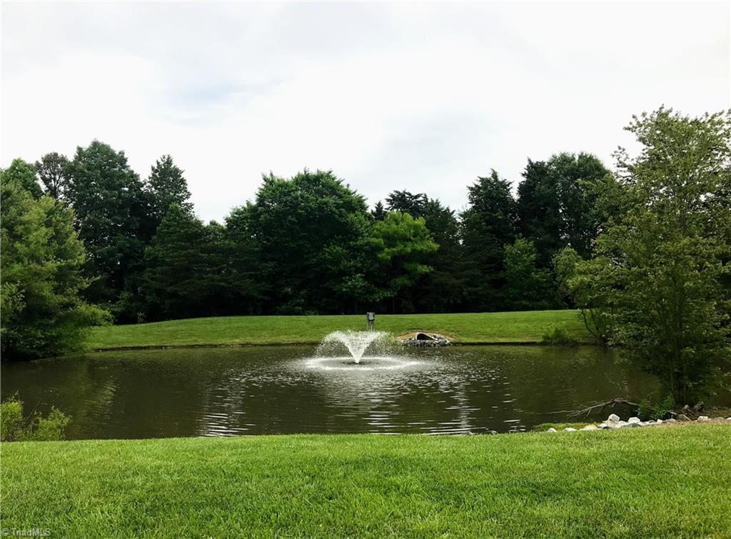 4402 Garden Club Street High Point, NC 27265 - Photo 18 of 23 Neighborhood Pond with Fountain off Garden Club Rd.