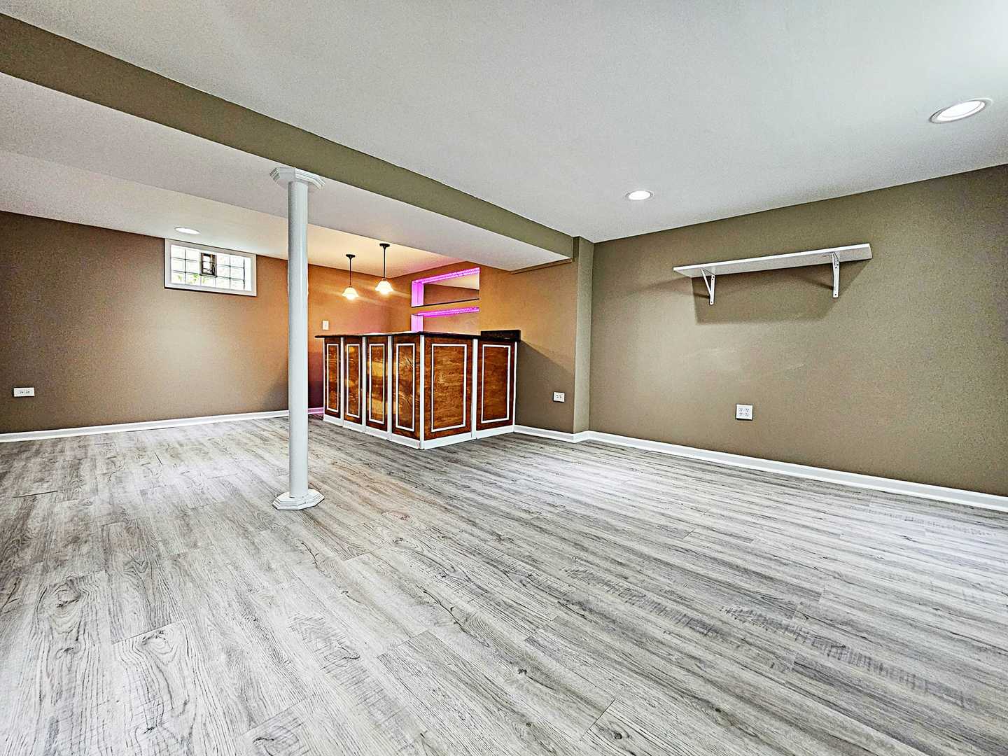 1546 State Line Road Calumet City, IL 60409 - Photo 12 of 16 a view of an empty room with wooden floor