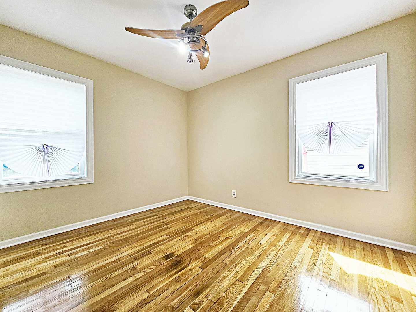 1546 State Line Road Calumet City, IL 60409 - Photo 7 of 16 a view of a room with wooden floor and window