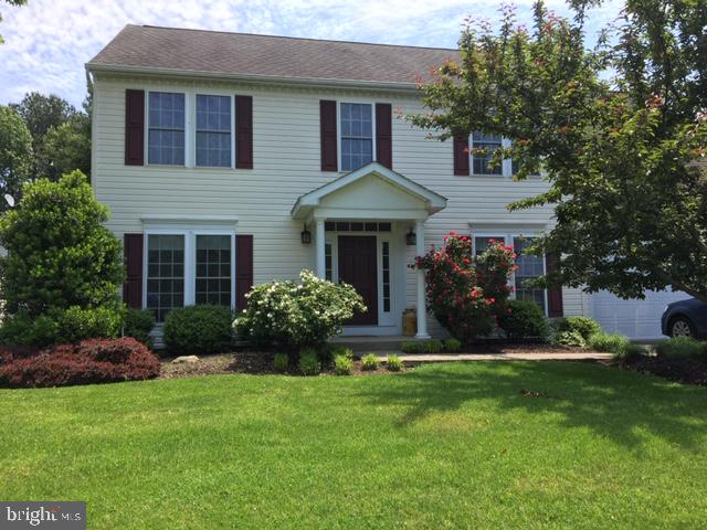 Spacious colonial with fenced backyard