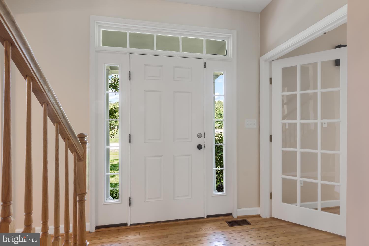 Entry foyer with entry to living room/study.
