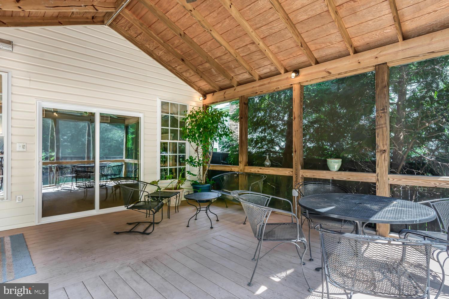 608 Old Love Point Road Stevensville, MD 21666 - Photo 33 of 45 Screened porch off the great room.