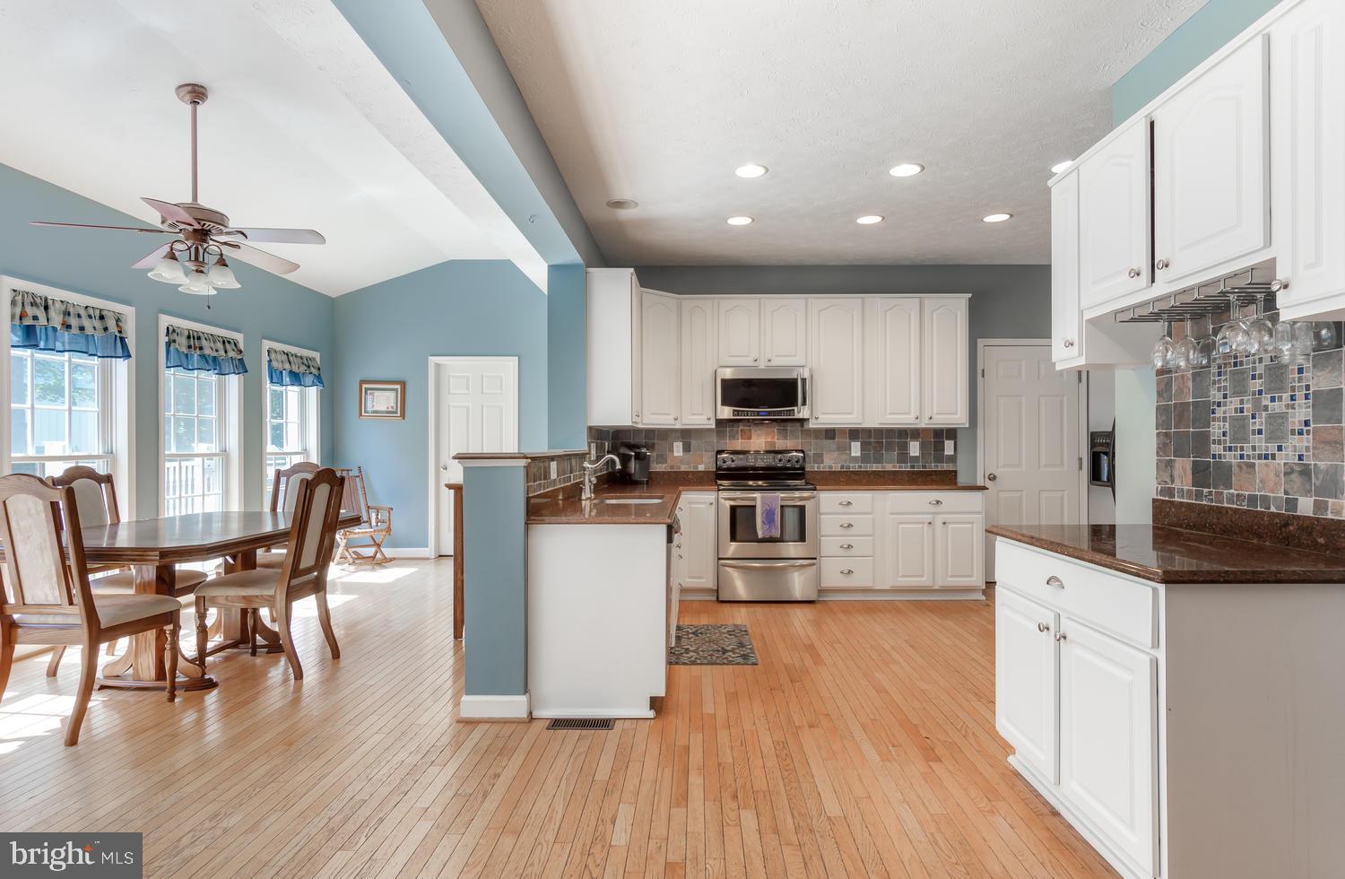 Spacious and bright kitchen area.
