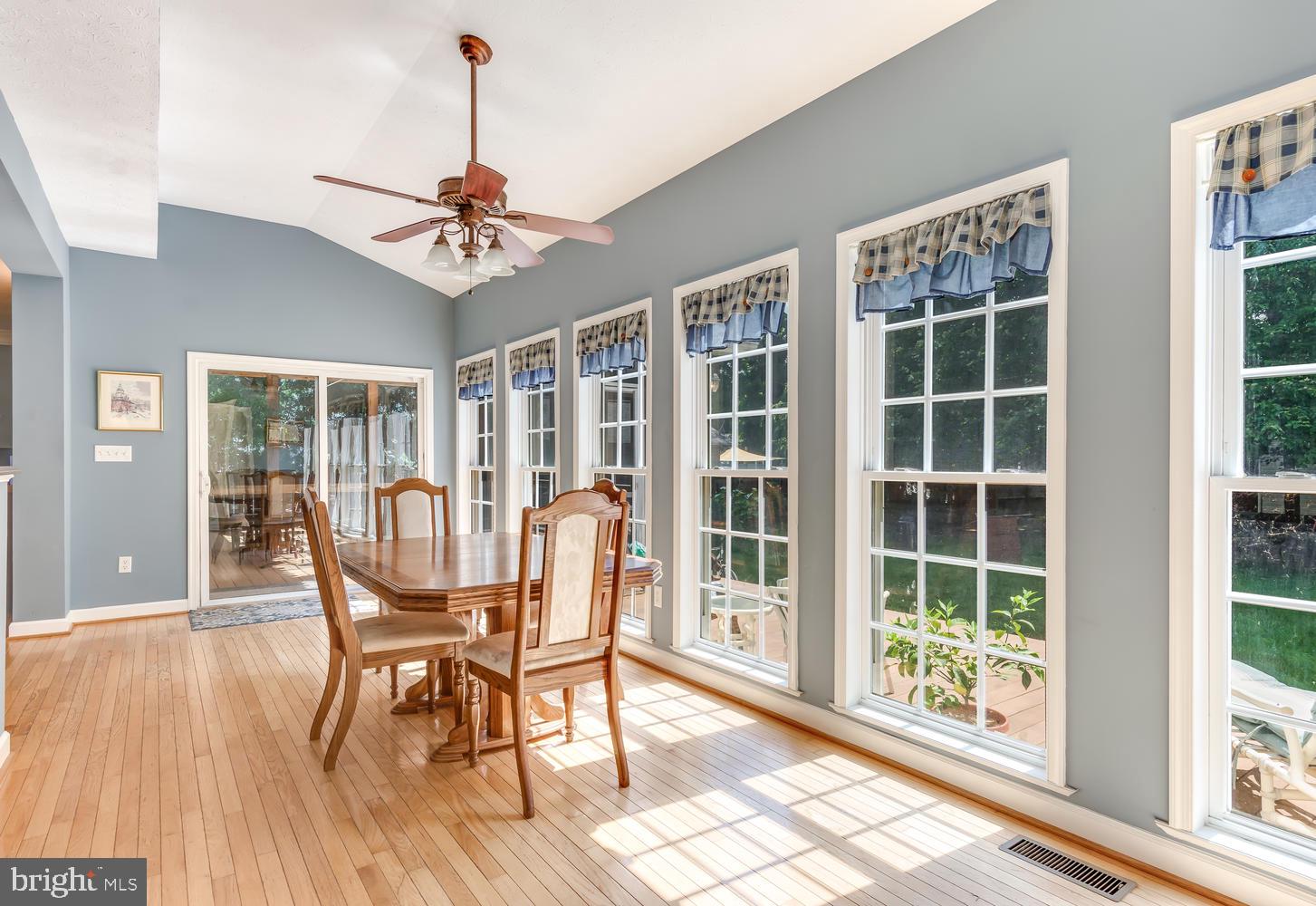608 Old Love Point Road Stevensville, MD 21666 - Photo 8 of 45 Sun room with breakfast area