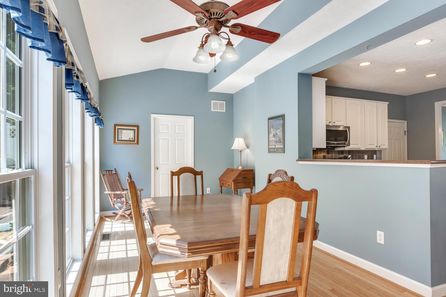 608 Old Love Point Road Stevensville, MD 21666 - Photo 9 of 45 Breakfast area in sun room. Open to kitchen.