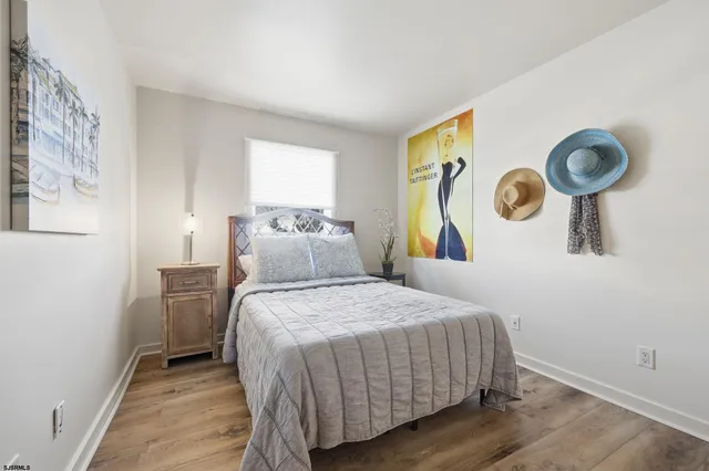 a bedroom with a bed and a walk in closet