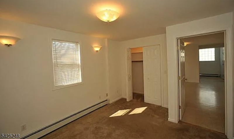 540 Joyce Street Orange, NJ 07050 - Photo 6 of 9 an empty room with windows