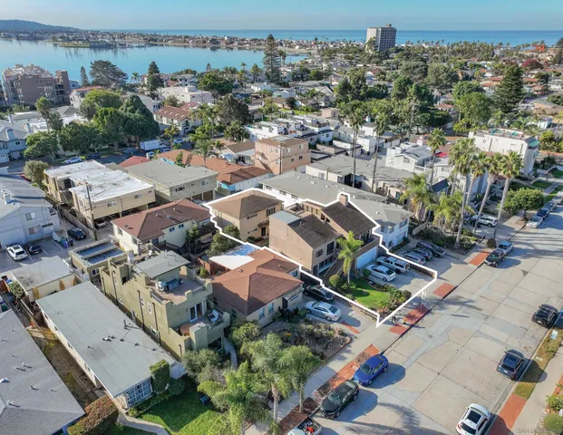 an aerial view of a city with lots of residential buildings
