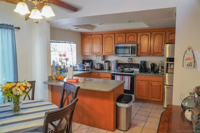 a bathroom with a toilet a sink and shower