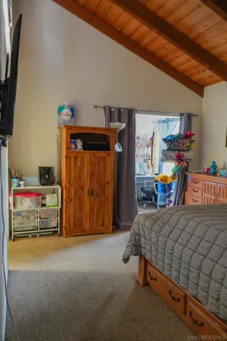 a bathroom with a tub a sink and a shower