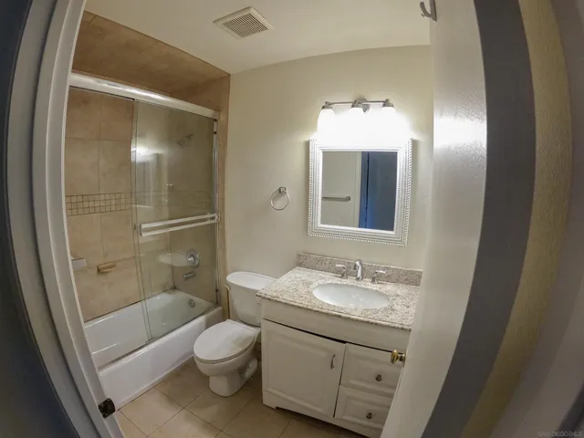 a car parked in front of a house