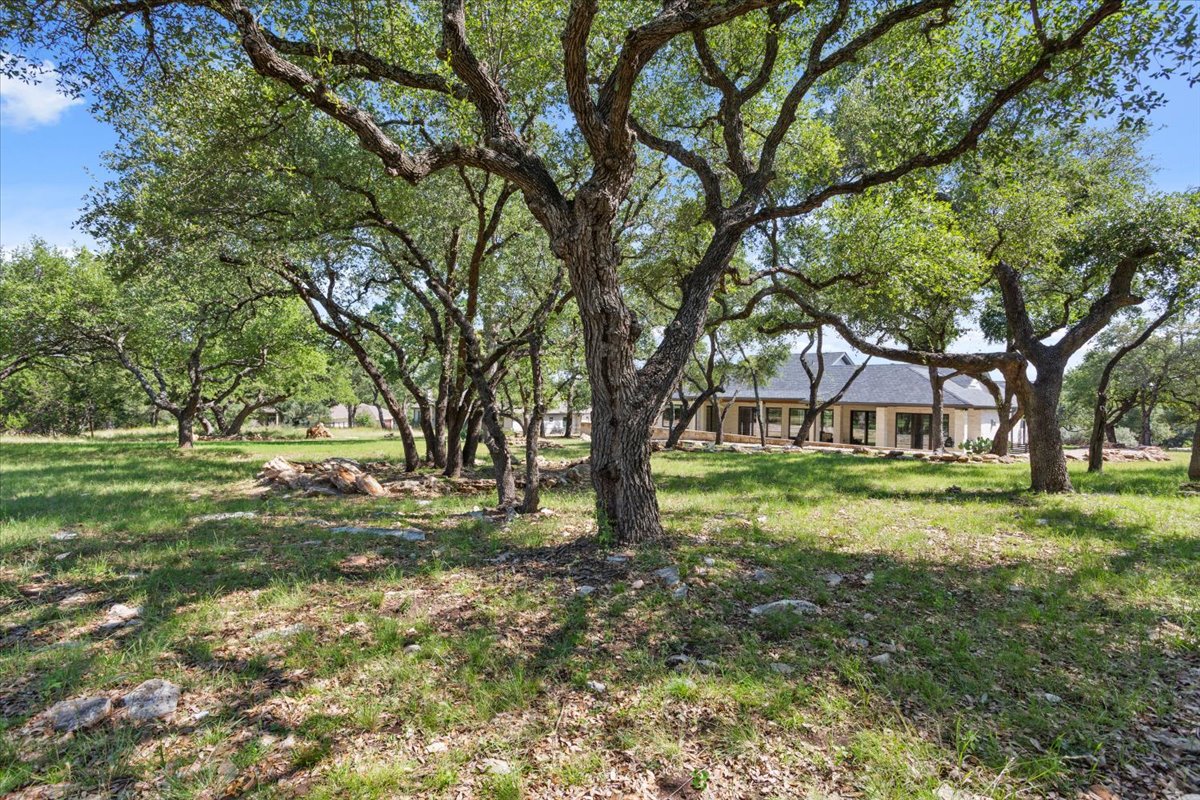 309 Highland Spring Lane Georgetown, TX 78633 - Photo 36 of 40 Oh my gosh...such a backyard. The property line goes all the way back to the other house's fence line. If you want a pool, there is plenty of room for that...
