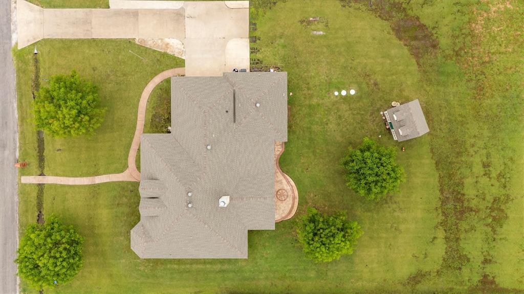 6581 Meadow Ridge Circle Nevada, TX 75173 - Photo 14 of 40 an aerial view of a house with a yard